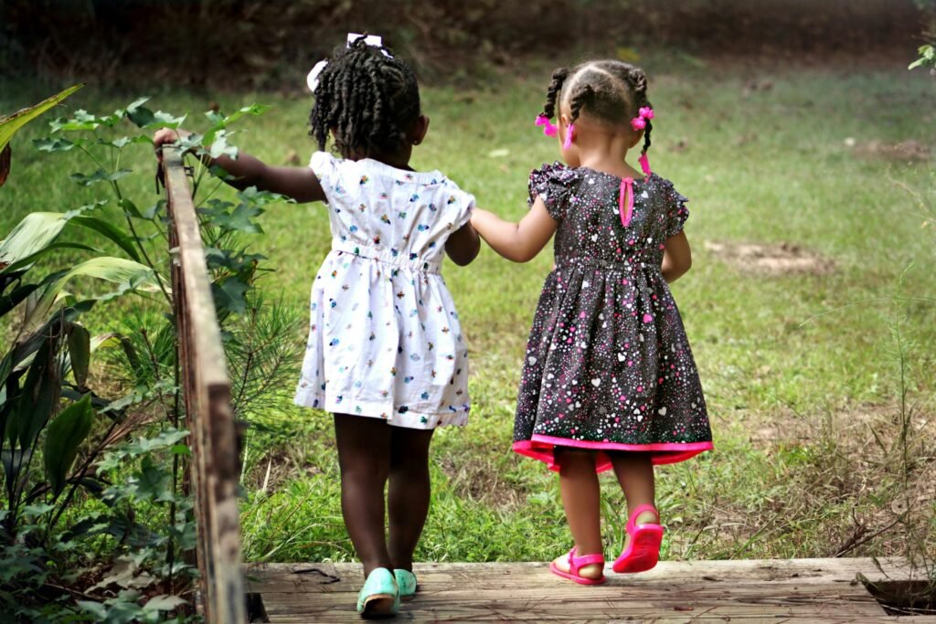 Children’s Clothing Alterations – Eva’s Alterations Jacksonville Two young gTwo young girls in colorful dresses – children’s clothing alterations by Eva’s Alterations Jacksonville